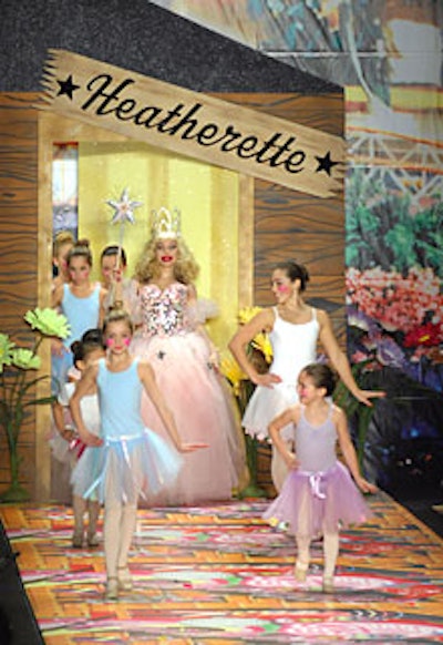 The lights came up on the set to reveal a cartoonish and colorful runway, dotted every few feet with starbursts and Heatherette logos.