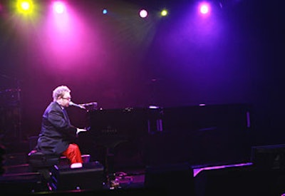 Elton John performed a set of his early songs.