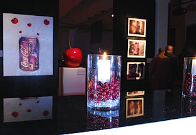 Large vases filled with cherries served as candleholders.