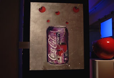 Sneaker designer David White’s take on the new Cherry Coke can was one of the art pieces displayed in the gallery.