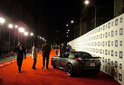 GM parked its cars along the length of a sprawling red carpet.
