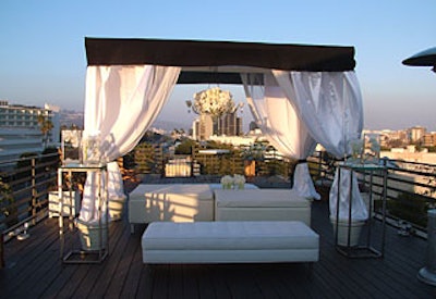 Sonya Dakar’s rooftop got a wedding-ish look with billowy white fabrics.