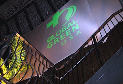 Global Green's logo showed on giant white screens in the V.I.P. balconies.