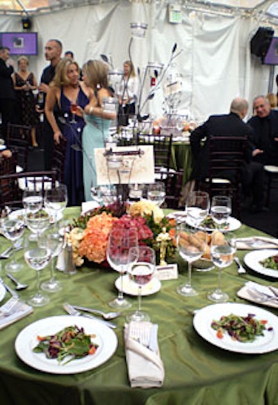 Centerpieces comprised of roses and hydrangeas adorned the tabletops of the dinner.