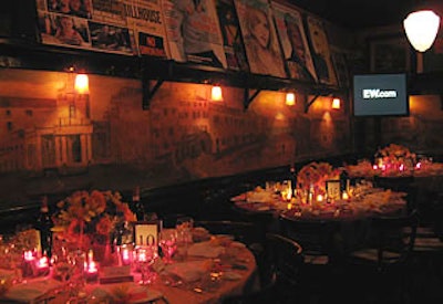 David Stark embellished the tables at Elaine's with silk tablecloths in reddish brown, red, and yellow, and small arrangements of spring blossoms in similar colors. As it did last year, Entertainment Weekly placed M&M's decorated with 'EW' at each place setting.
