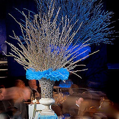 A palette of turquoise and brown was borrowed from the event’s invitation. Blue tablecloths adorned silent-auction stations, and blue tutus embellished large vases of pussy willows.