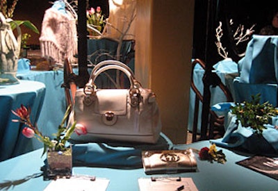 The night’s silent auction featured more than 100 items, including the Marc Jacobs and Gucci handbags pictured here.