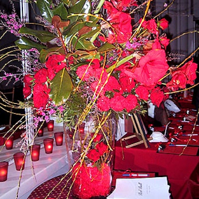 This arrangement of large red flowers by David Beahm contained a small grouping of flowers inside the base of the vase.