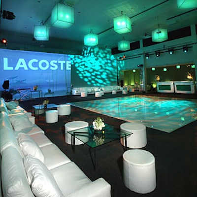 Lime green light—the color of the Lacoste crocodile—permeated the venue.