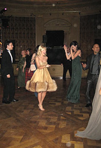 In the music room, DJ Pat “Caramel” Regne held court while committee members, including the ubiquitous Tinsley Mortimer, hit the dance floor with designer Angel Sanchez (an event sponsor who dressed many of the committee members).