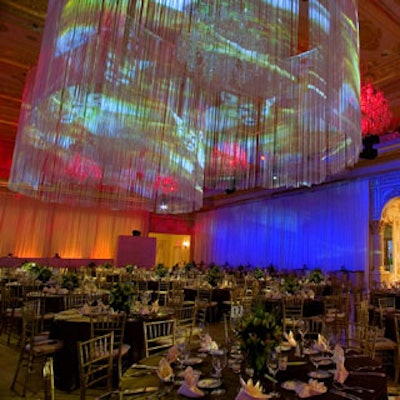 Sutka Productions hung imported projection fringes on the chandeliers, in order to display images, such as this three-dimensional overhead shot of the Everglades, to the crowd.