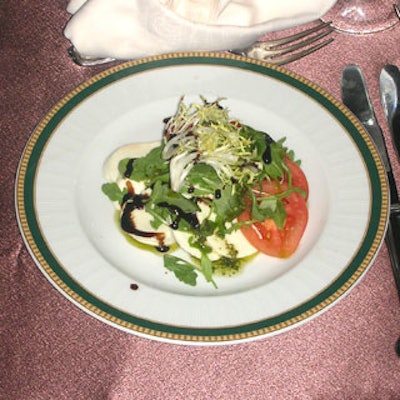 As guests sat at their numbered tables, food was already waiting for them—arugula and vine-ripened tomatoes, buffalo mozzarella, and basil oil and sweet balsamic vinegar.