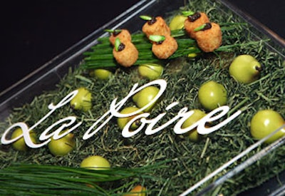 Serving trays at the La Poire event also incorporated pears. La Poire planners sought out new and unusual venues for its multi-city campaign.The brand held its New York event at the Daryl Roth Theatre; other spaces included a renovated synagogue (now a private home) in Miami, an old bank in San Francisco, and a house featured in the HBO series Entourage in Los Angeles. Jenny McCarthy hosted the La Poire stop in Boston.