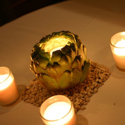 Hollowed-out artichokes functioned as whimsical votive candle holders.