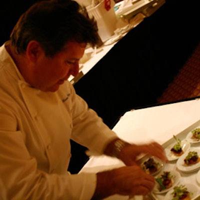 Chef Norman Van Aken plates mini-BLTs for the cocktail reception at the Loews.