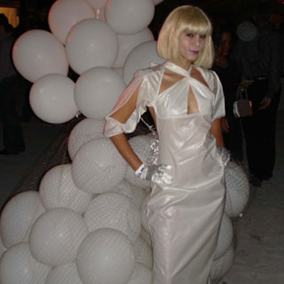 Bubbles—well actually, white balloons—were incorporated into the models' clothing designs.