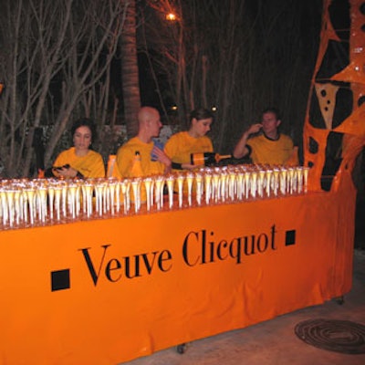 Arriving guests were served champagne at the 'Bubble Lady Bar,' made of fiberglass and measuring 15-feet.