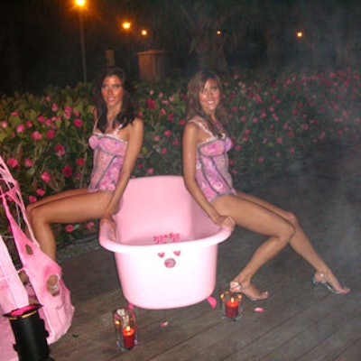 The 'Rose Lounge' featured models in body paint, pink bathtubs, an installation of over 2,000 pink roses, and plenty of Veuve Clicquot Rosé.
