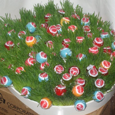 Food Network lollipops were placed in the event's many wheatgrass floral arrangements.
