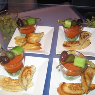 Mini grilled cheese sandwiches and Bloody Mary shot glasses were served on five-inch white plates.