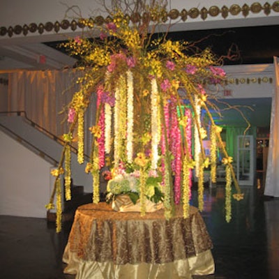 A whimsical effect was achieved through the use of massive, multi-colored floral centerpieces like the one pictured here.