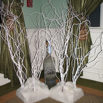 The decor included wintry vignettes of snow-covered trees surrounding a large bottle of Belvedere.