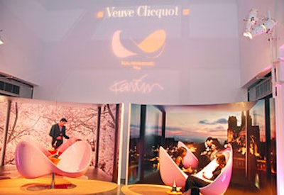 Inside the penthouse of west Chelsea’s Milk Studios, the New York cocktail party featured two podiums with curved walls displaying the chair on oval, saffron-colored carpets.