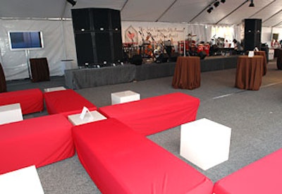 Decor was simple, with red Table 8 daybeds and gray industrial carpeting in sync with the color palette prescribed by Varvatos’s visual design team.