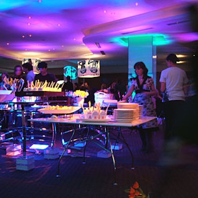 At Fox’s casual, unpretentious party for this season’s top 12 American Idol contestants, a changing lighting scheme rotated through candy colors.