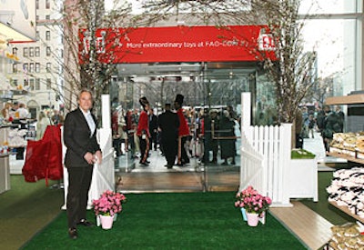 Stroud (pictured) created an archway of white cherry branches over the store’s main entrance.