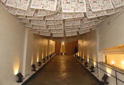 Even the entryway stayed true to the cause: Leftover party invitations printed on recycled paper with vegetable-based ink hung from the ceiling.