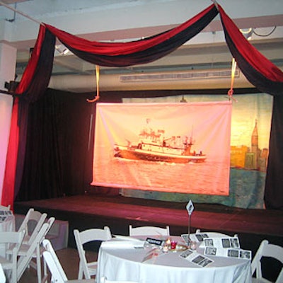 Organizers draped the stage in swags of red and blue fabric and hung a large banner of the fireboat.
