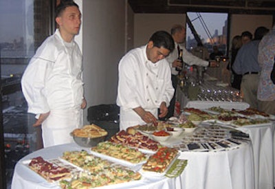 Buffet stations, set up for the cocktail hour and dinner, offered an array of finger foods, such as crostini topped with cheese and roasted vegetables.
