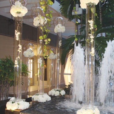 An installation of white hydrangeas and glass cylinders decorated the winter area.