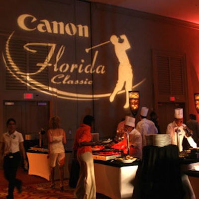 The Legends Ballroom featured lighted branding during the fund-raiser, such as the event's logo—a golfer, mid-swing.