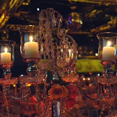 Silver and crystal candelabra centerpieces accented by flowers from Forget Me Not Flowers.