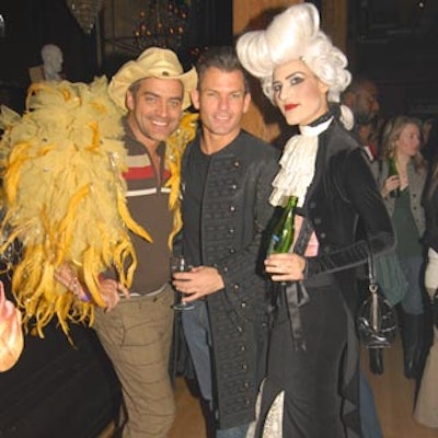 Ballet dancer Rex Harrington (left), Kontent CEO Michael King (centre), and Hello magazine managing editor Laura Brown (right) dressed in costume for Kontent's and Lanc?me Paris' joint pre-Oscar party at This Is London.