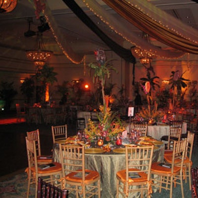 The entire room was draped in a sheer material lined with miniature white lights that contributed to the exotic ambiance.