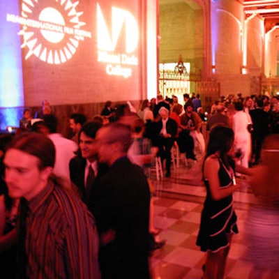 Guests sipped cocktails and chatted in the Art Deco bank hall.