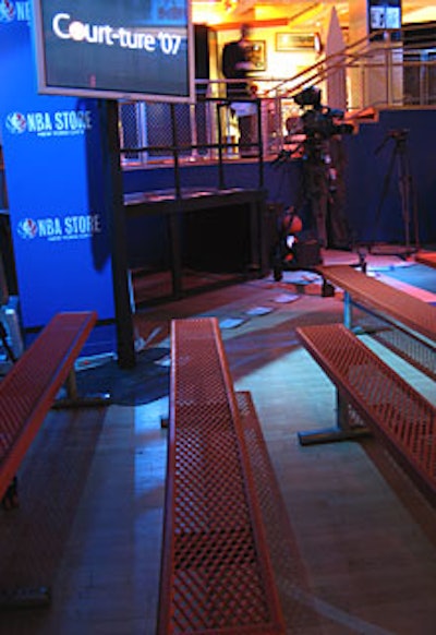 In addition to the bleachers surrounding the court area, guests sat on orange bench seating borrowed from the NBA.