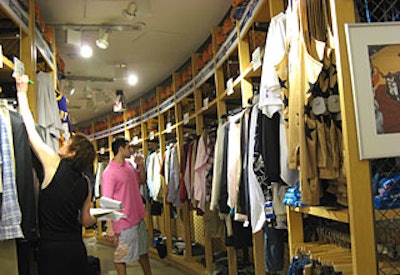 Rather than bringing in coat racks, the planning team used the store’s locker-style section as a backstage dressing room for the models.
