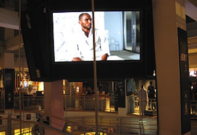 During the show, the venue’s Jumbotron showed images from the runway.