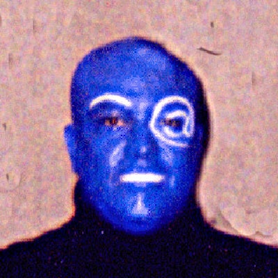 Guests at KPE's fifth anniversary party were greeted by a security guard whose face was painted blue to resemble the company's blue-head logo.