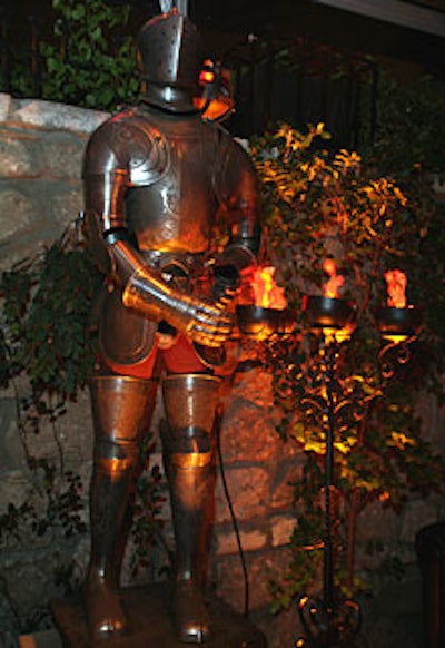 A suit of armor menaced party guests.