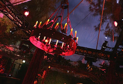 A wrought-iron chandelier hung from the ceiling.