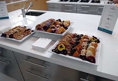 Trays on kitchen countertops offered an array of cookies.