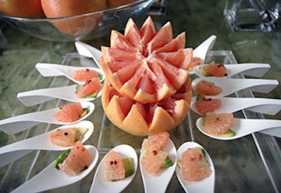 While guests mingled before being seated, Olivier Cheng served dishes such as pink grapefruit with avocado and pink peppercorn in a spoon.
