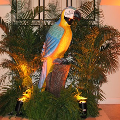 This parrot vignette that stood in the hallway was a good example of the event's rain forest-like decor.