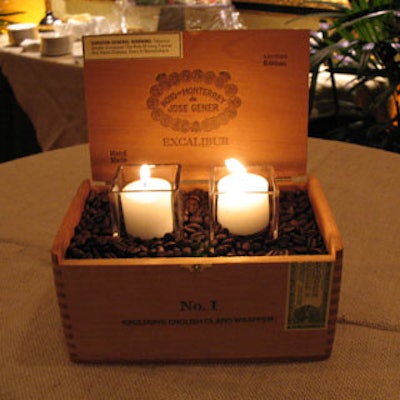 High-top cocktail tables were draped in chocolate and burlap linens with coffee bean-filled cigar box centerpieces.