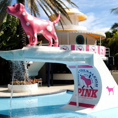 Mini Dog, Pink's mascot of the moment, shows his—or is it her?—true colors from atop the Raleigh's iconic diving board.